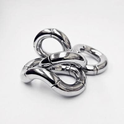 Tangle Jr. Metal – tung fidgetskulptur i metall